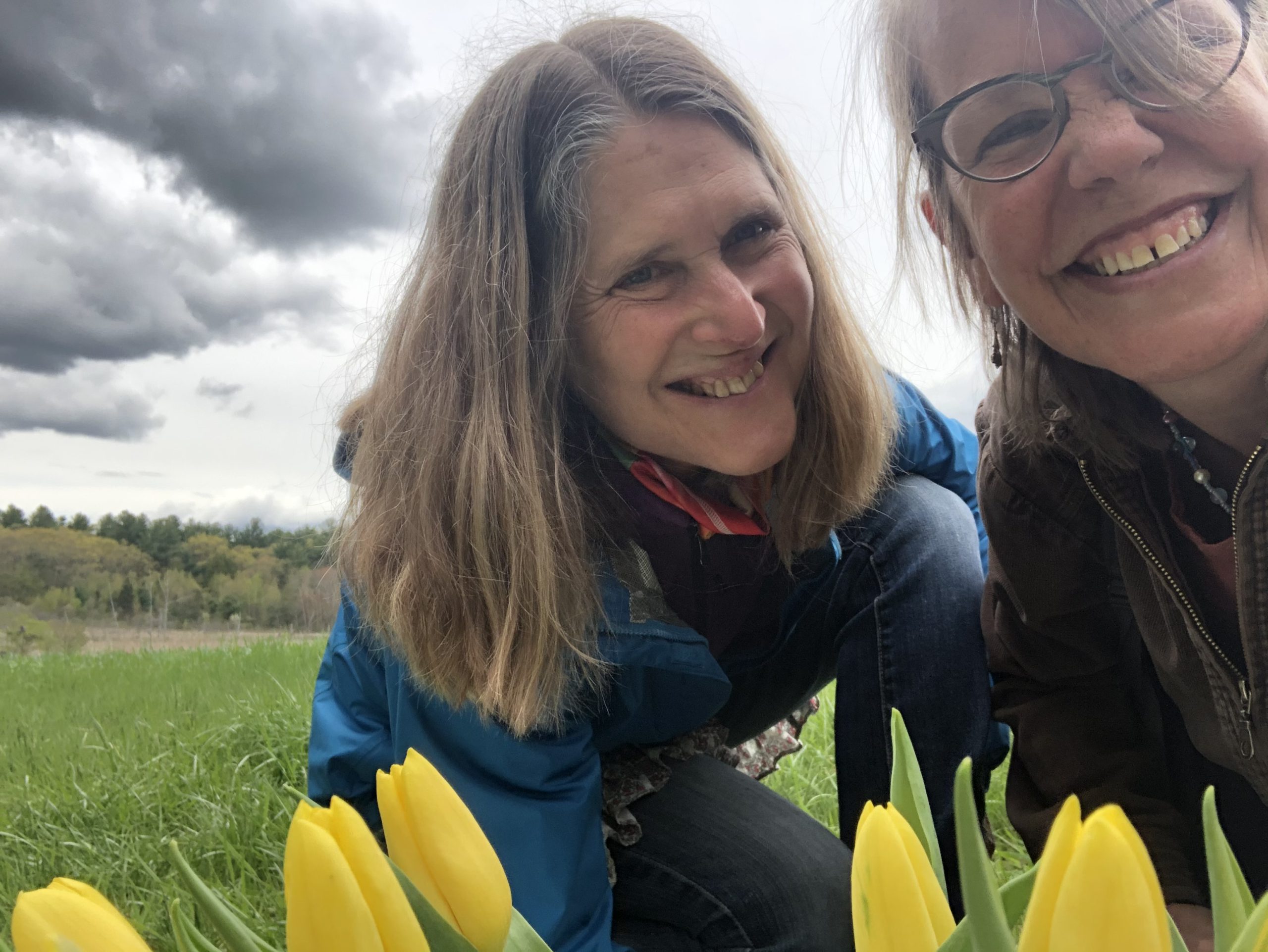 Ellie and Sylvana and yellow tulips